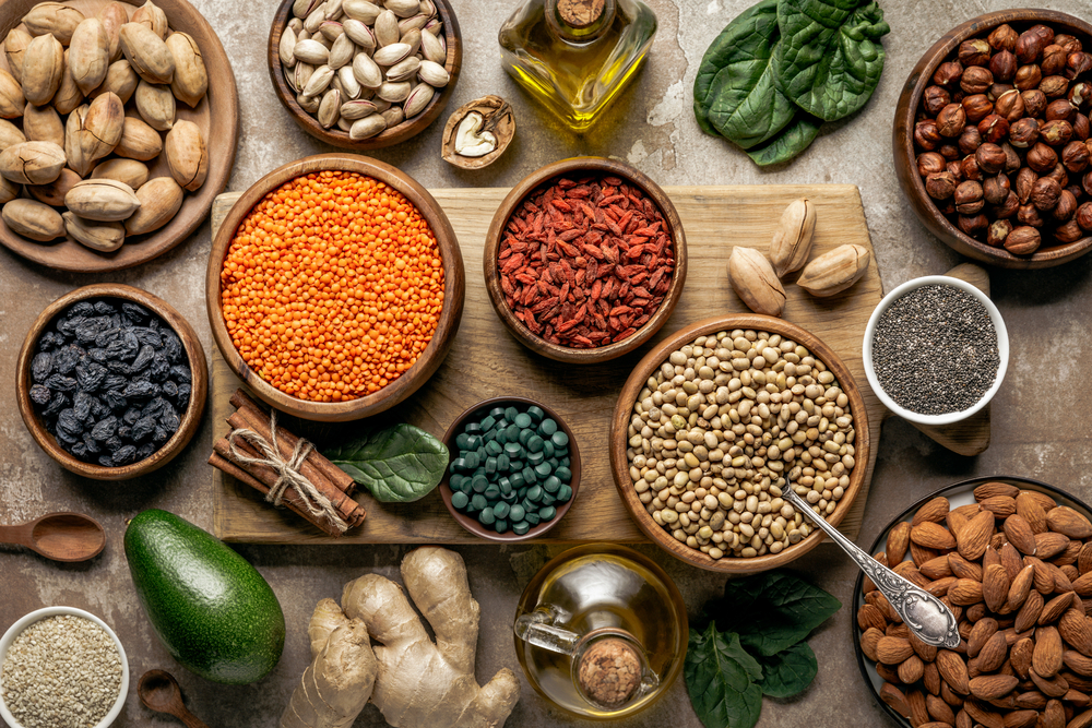 variety of superfoods in bowls on the desk